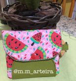 Mini carteira porta cartões.